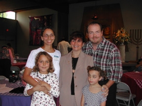 Judy and my family. (Judy is in the centre. We took this picture.)