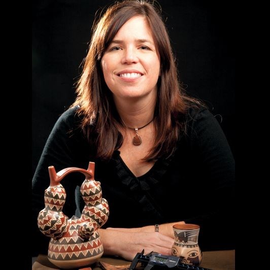Christina Conlee posing by some artifacts. (https://www.archaeological.org/lecturer/christinaconlee)